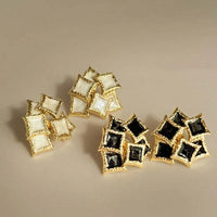 Spacewallart REINE accessories displayed with intricate design details on a sleek surface.