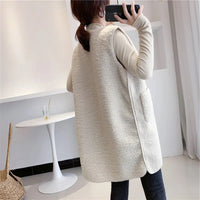 Loose coat from Spacewallart apparel collection, shown hanging with a relaxed fit and stylish design.
