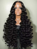 Loose deep wave human hair wig by Spacewallart showing long, wavy hair with natural luster and layered style.