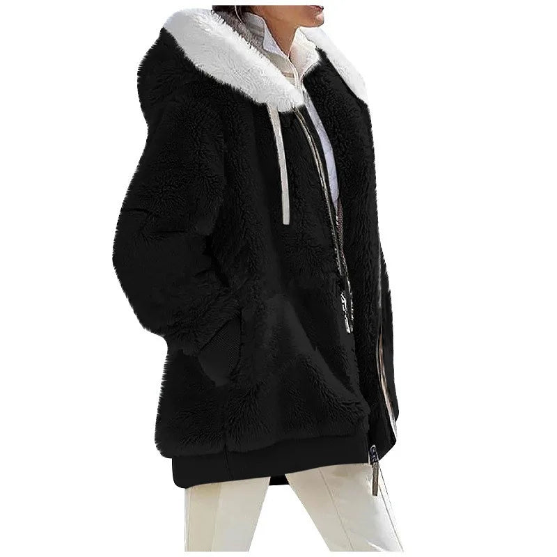 Spacewallart Cashi Hoodie in black, featuring a comfortable fit and stylish design, shown on a person wearing it.