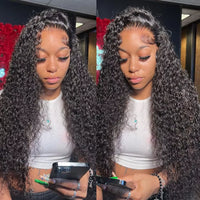 Curly human hair wig by Spacewallart featuring voluminous, natural black curls styled on a mannequin head.
