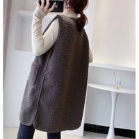 Loose coat from Spacewallart, showing a relaxed fit and casual style in neutral fabric on a hanger.