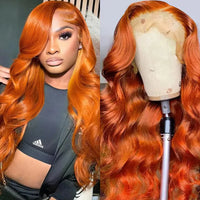 Orange ginger body wave HD transparent human hair wig by Spacewallart, showcasing voluminous, natural-looking wave texture.
