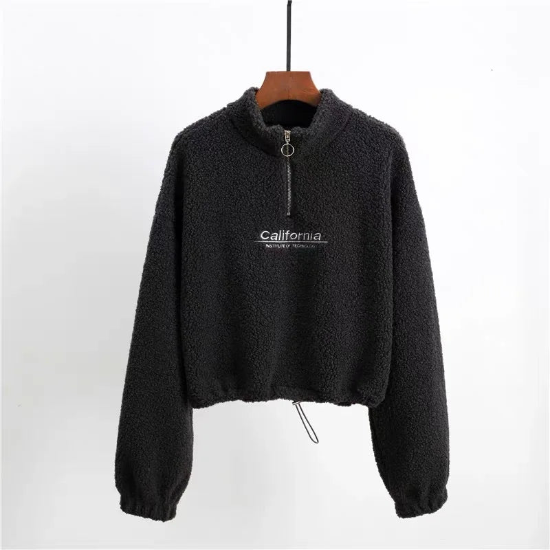 Spacewallart AXE hoodie, black casual apparel with front pocket and hoodie, displayed on a hanger.