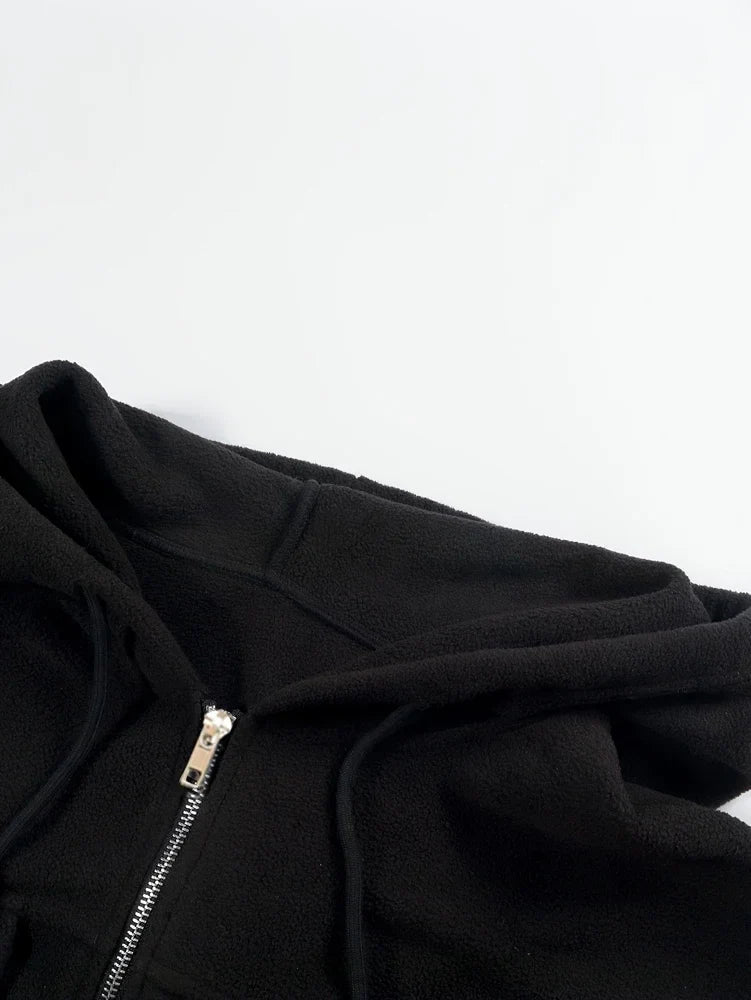 Spacewallart DEFI jacket, stylish apparel with a modern design, shown in a close-up view highlighting fabric texture and details.
