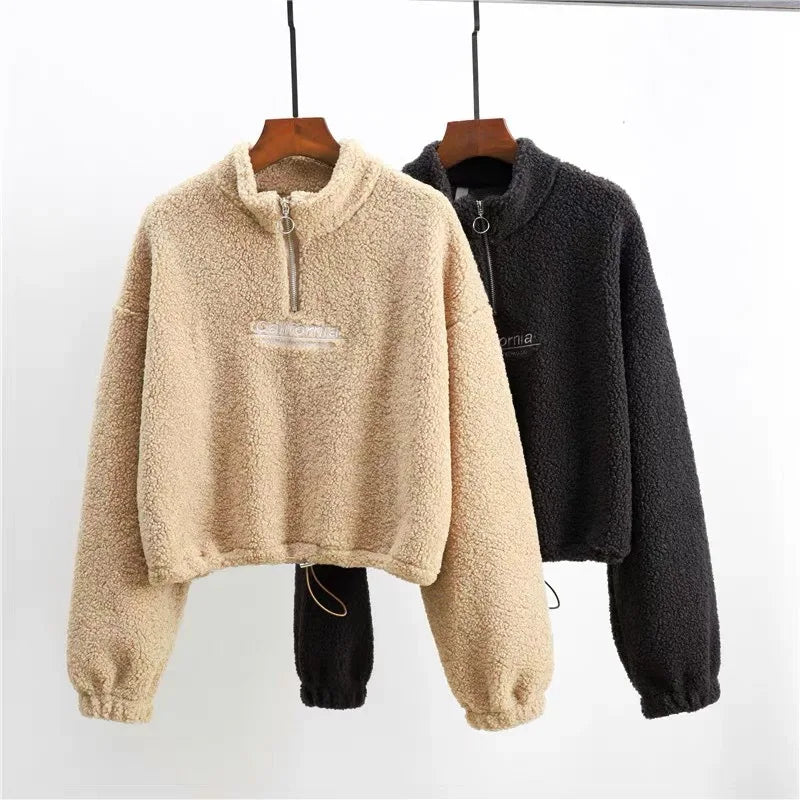 Spacewallart AXE hoodie, a stylish black apparel with front pocket and adjustable drawstrings, perfect for casual wear.