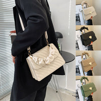 Spacewallart chain shoulder bag featuring a stylish design, with a chain strap and compact accessory style for everyday use.