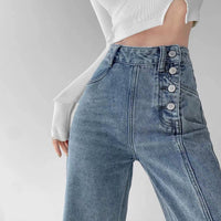 Spacewallart irregular breasted high waist jeans, denim apparel featuring unique design and high-rise fit, shown on a model.