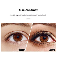 Spacewallart waterproof smudge-proof thick curling mascara applied to eyelashes, enhancing curl and volume for a bold eye look.