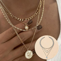 Gold chunky necklace from Spacewallart, featuring bold, textured links, styled as a statement accessories piece.