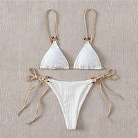 Solid color strap bikini in vibrant shades, featuring two-piece swimsuit design from Spacewallart, displayed flat on a white background.
