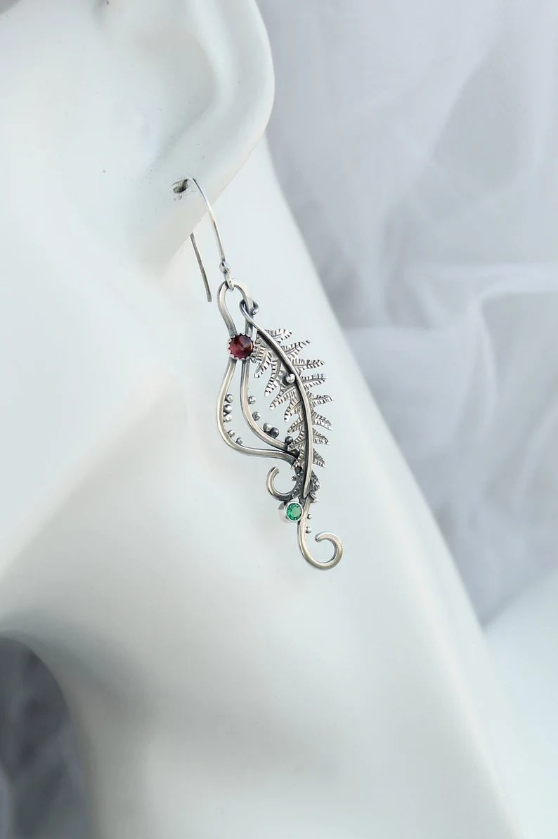 Silver tail shape earrings from Spacewallart, stylish accessory jewelry with sleek, modern design.