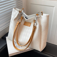 Rhombus pattern tote chain shoulder bag from Spacewallart, featuring a stylish accessories design with a geometric pattern.