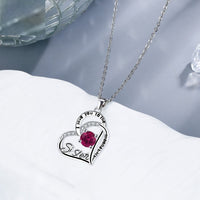 Silver sister necklace from Spacewallart, featuring a delicate chain and pendant, styled as elegant accessories for special occasions.
