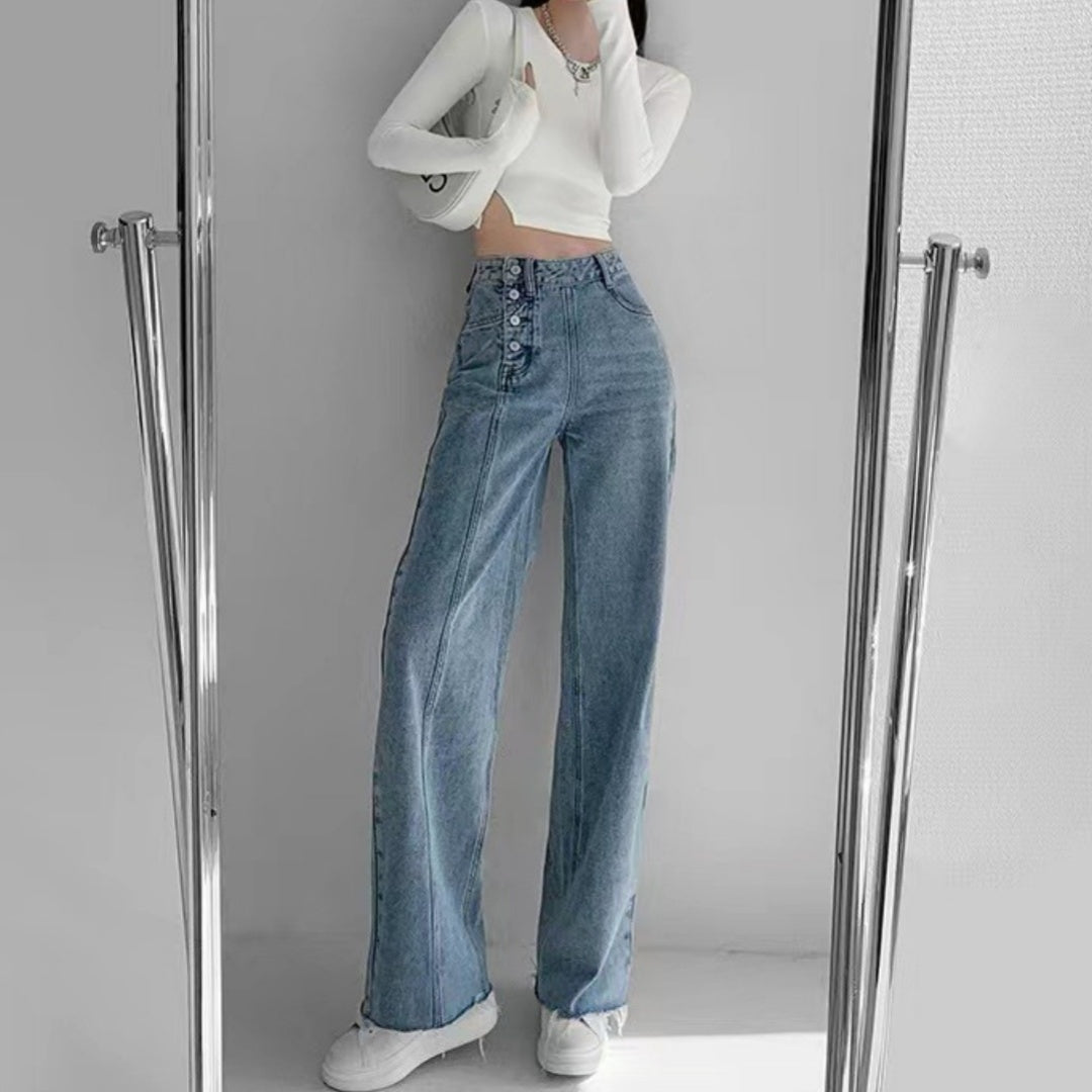 Spacewallart irregular breasted high waist jeans featuring a unique design, denim fabric, and a fitted high-rise silhouette.