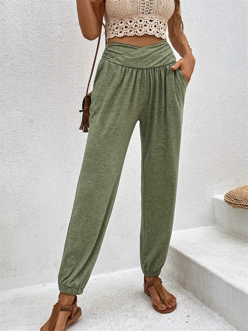 Spacewallart casual loose ankle-tied trousers with pockets, relaxed fit and stylish design, shown in the image.