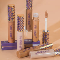 Spacewallart concealer repair foundation makeup tube with applicator, featuring a sleek black design and visible product branding.