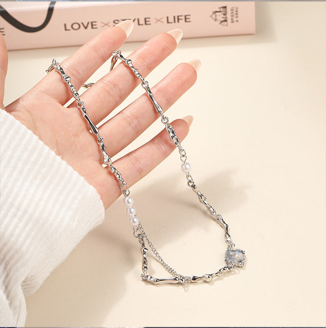Spacewallart fashion irregular necklace with unique, asymmetrical design as an accessory, featuring mixed metal elements.