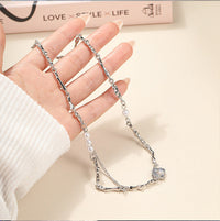 Spacewallart fashion irregular necklace with unique, asymmetrical design as an accessory, featuring mixed metal elements.