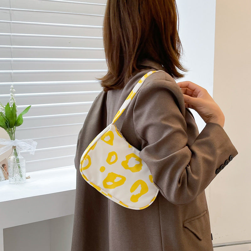 Korean street trend hand-carried bag by Spacewallart, stylish accessory with modern design and vibrant colors.