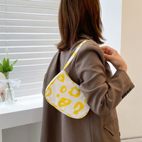 Korean street trend hand-carried bag by Spacewallart, stylish accessory with modern design and vibrant colors.