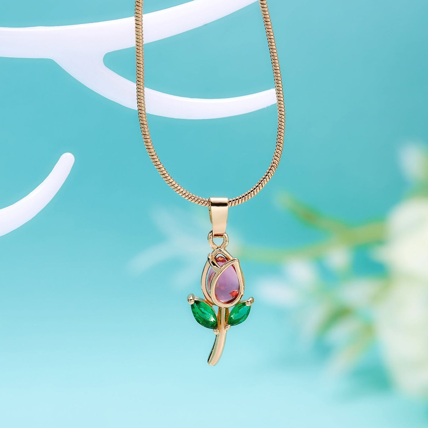 Elegant tulip-shaped necklace from Spacewallart, showcasing a delicate floral pendant on a fine chain.