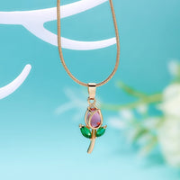 Elegant tulip-shaped necklace from Spacewallart, showcasing a delicate floral pendant on a fine chain.