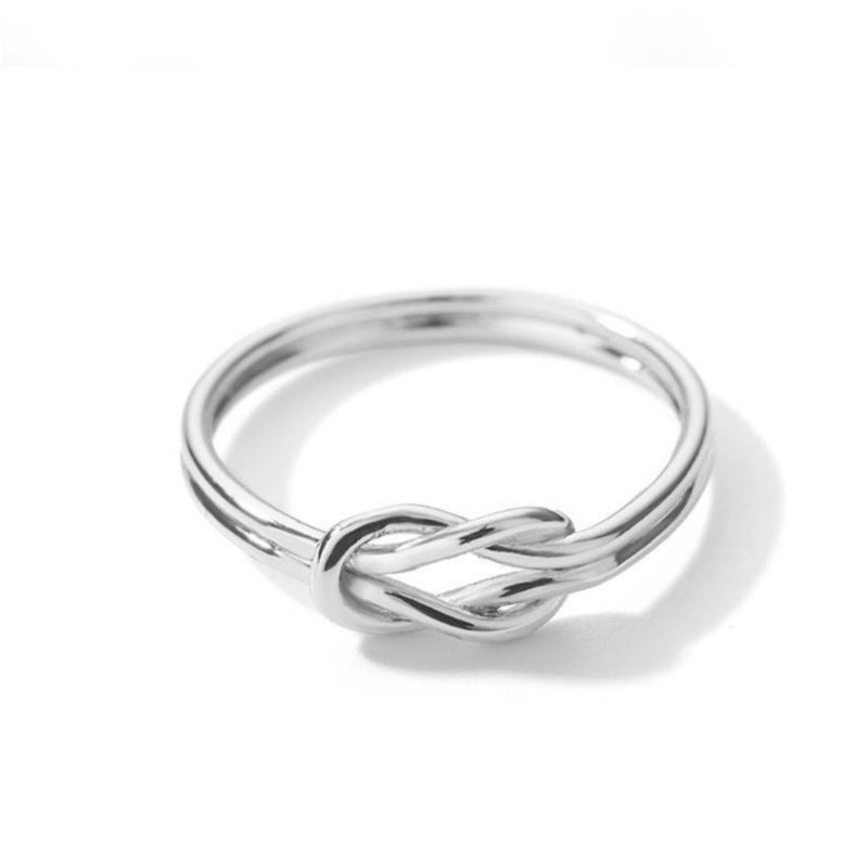 Spacewallart zircon cross wrap ring, silver-tone accessories with sparkling zircon embellishments and a stylish cross design.