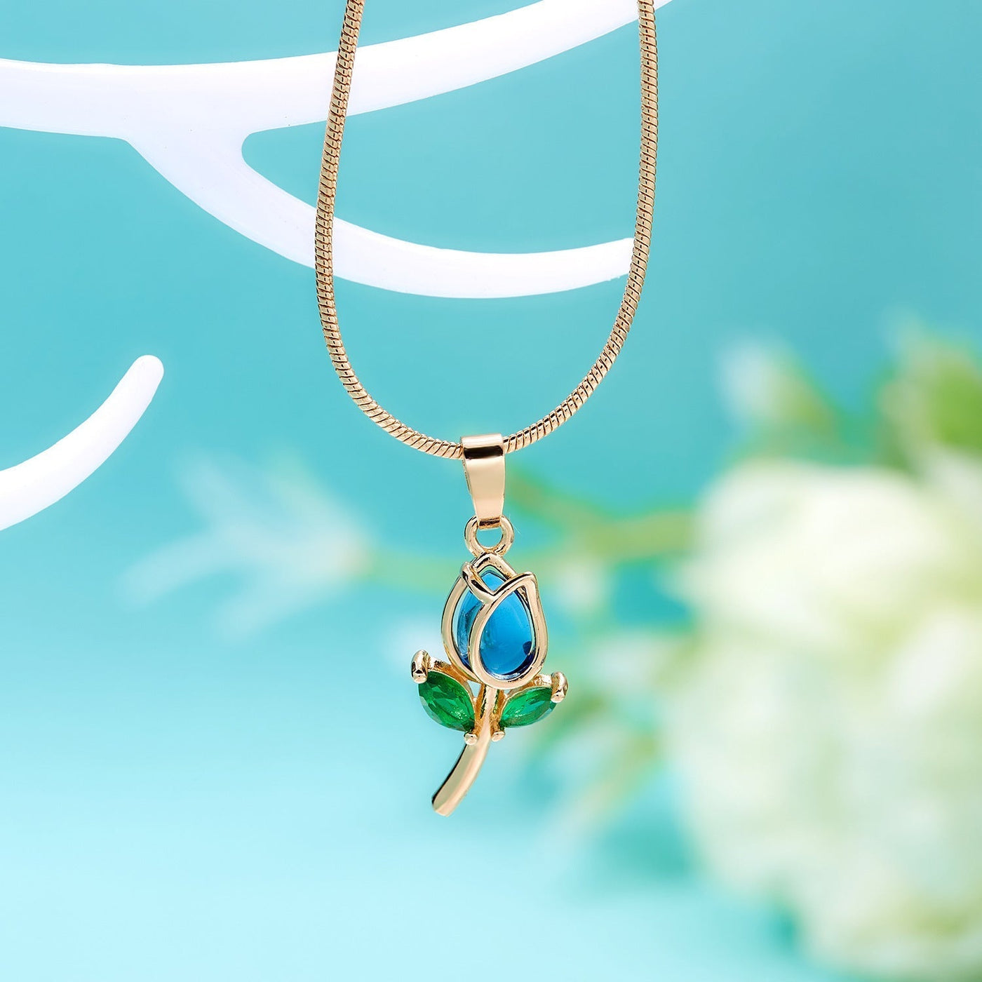 Elegant Tulip Necklace from Spacewallart featuring a delicate tulip-shaped pendant on a fine chain.