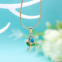 Elegant Tulip Necklace from Spacewallart featuring a delicate tulip-shaped pendant on a fine chain.