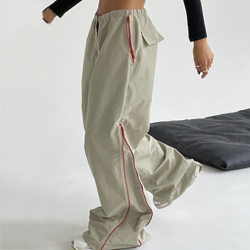 Spacewallart women's loose trousers, all-matching casual apparel with relaxed fit and comfortable waistband, in neutral fabric.