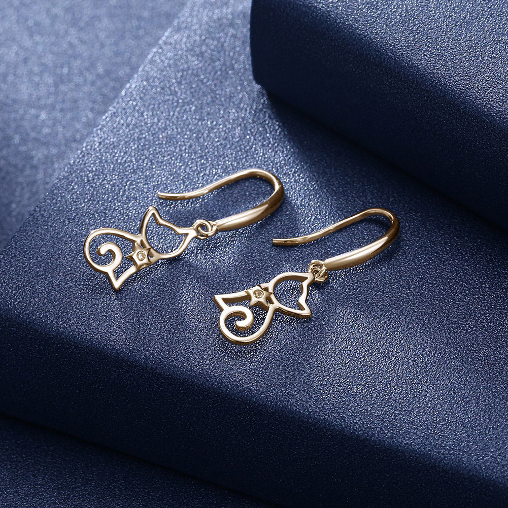 Sterling silver cat zircon earrings with shiny stones and detailed feline design, perfect for elegant accessories.