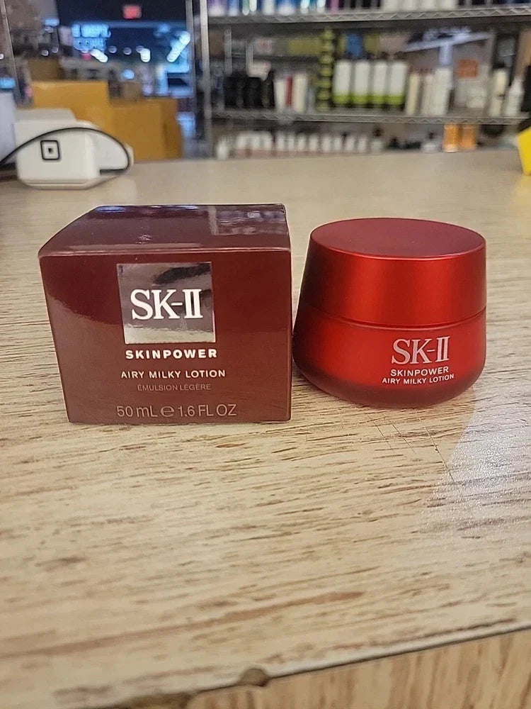 SK-II Skinpower Airy Milky Lotion in 1.6 oz bottle, lightweight beauty moisturizer with smooth, milky texture.