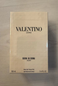 Valentino Uomo Born In Roma Ivory Eau de Toilette for Men in 3.4 oz bottle, sealed, with elegant packaging and minimalist design.