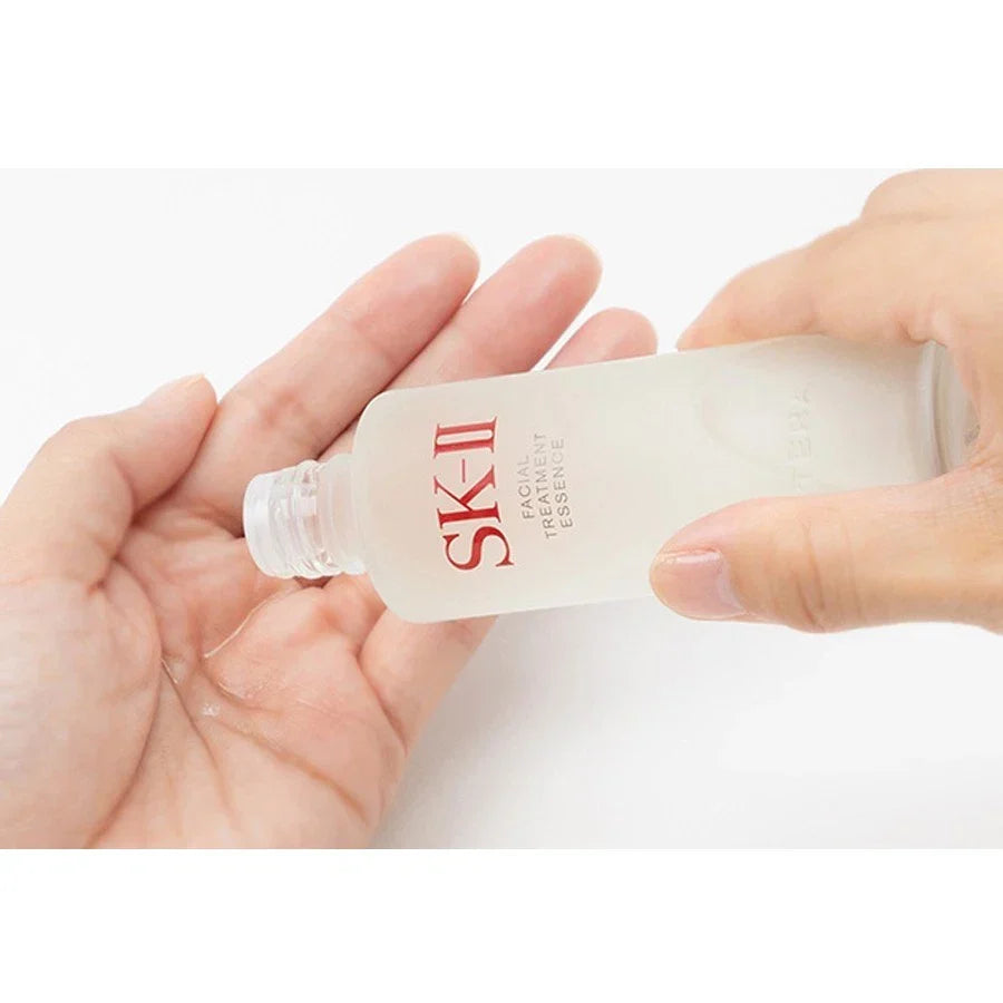 SK-II Facial Treatment Essence bottle, 230ml, with clear glass container and label, showcasing the iconic skincare product.