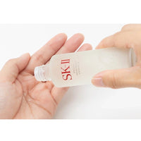 SK-II Facial Treatment Essence bottle, 230ml, with clear glass container and label, showcasing the iconic skincare product.