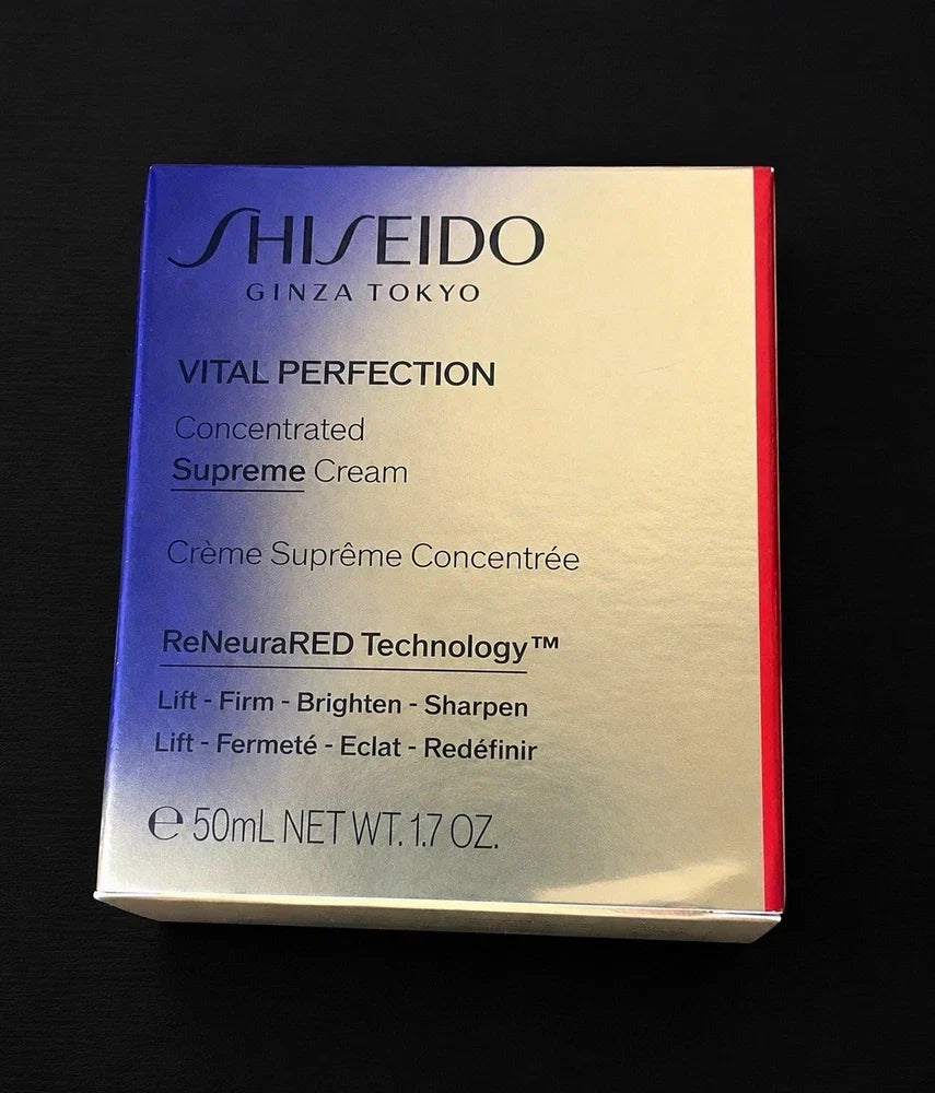 Shiseido Vital Perfection Supreme Cream in a sleek jar, 1.7 oz, with elegant packaging, designed for anti-aging skincare.