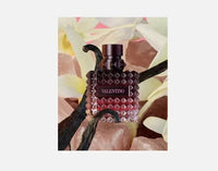Valentino Donna Born In Roma Intense Eau de Parfum for Women, 3.4 oz, with elegant perfume bottle and floral accents.