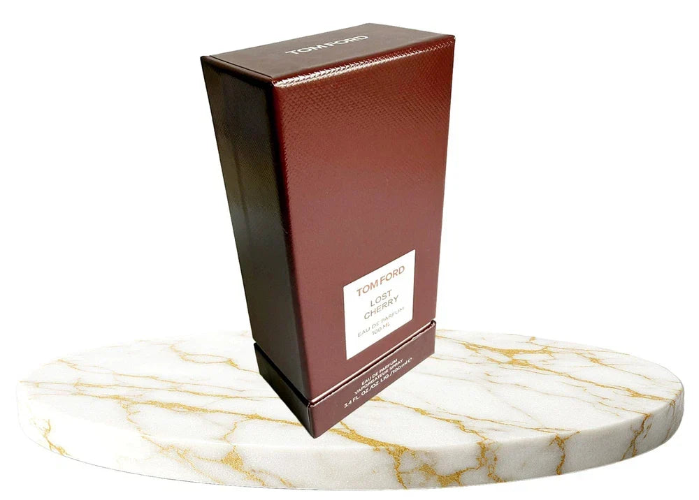 Tom Ford Lost Cherry Eau de Parfum unisex bottle with 3.4 oz/100 ml size, featuring elegant packaging and luxurious scent details.