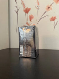 Azzaro The Most Wanted men's parfum spray bottle with a sleek design, pictured with a black cap and modern label.