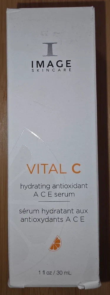 Image of Image Skincare Vital C Hydrating Antioxidant A C E Serum in a 1 fl oz bottle, showcasing a sleek, clear glass container with a dropper.