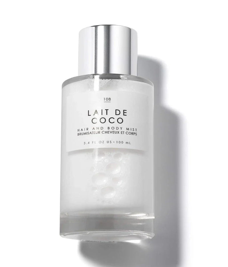Spacewallart Le Monde Gourmand Lait de Coco Eau de Toilette 3.4 oz, featuring a sleek bottle with coconut fragrance accents.