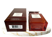 Tom Ford Lost Cherry Eau de Parfum bottle shown, featuring sleek design and clear label, 3.4 oz / 100 ml, unisex fragrance.
