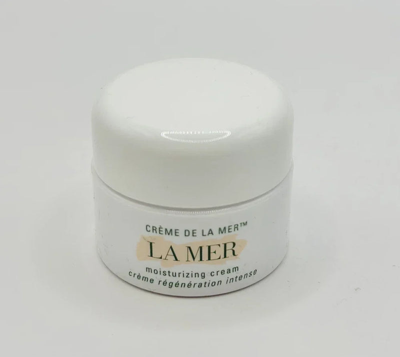 Small jar of La Mer Crème de la Mer moisturizing cream by Spacewallart, featuring luxurious skincare in a 0.24 oz container.