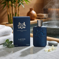 Parfums de Marly Layton Eau de Parfum spray for men, 4.2 oz, featuring a sleek glass bottle with a gold cap and elegant design.