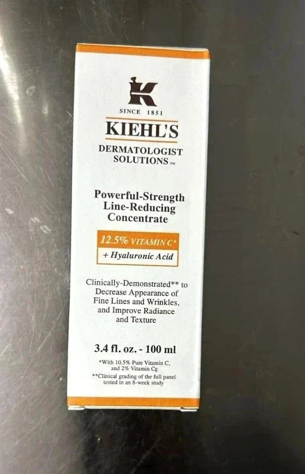 Spacewallart Kiehl's Powerful-Strength Line-Reducing Concentrate bottle with 12.5% Vitamin C and hyaluronic acid for skincare.