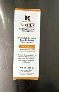 Spacewallart Kiehl's Powerful-Strength Line-Reducing Concentrate bottle with 12.5% Vitamin C and hyaluronic acid for skincare.