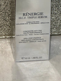 Lancôme Rénergie H.C.F. Triple Serum anti-aging face serum in sealed bottle, designed for skin rejuvenation and hydration.