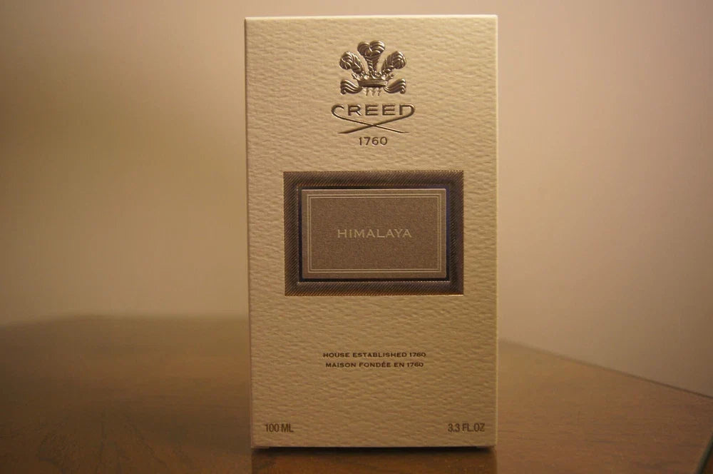 Creed Himalaya Eau de Parfum for Men in 3.3 oz bottle, sleek glass design with minimalist label, displayed on a neutral background.