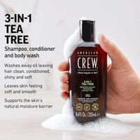 American Crew 3-in-1 Tea Tree Shampoo, Conditioner & Body Wash bottle, 33.8 fl oz, with green tea tree label and pump dispenser.